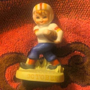4/10$ October Boys Football Figurine
